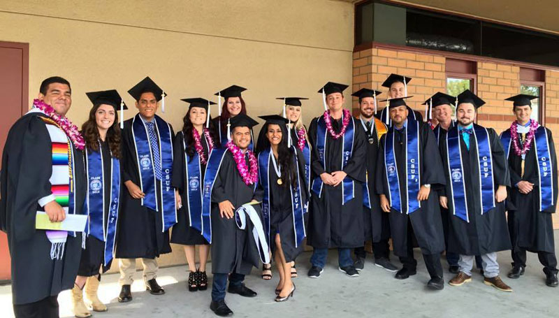 Graduating students posing