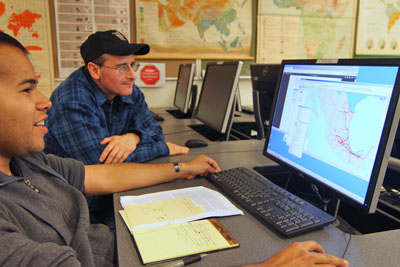People in front of a computer